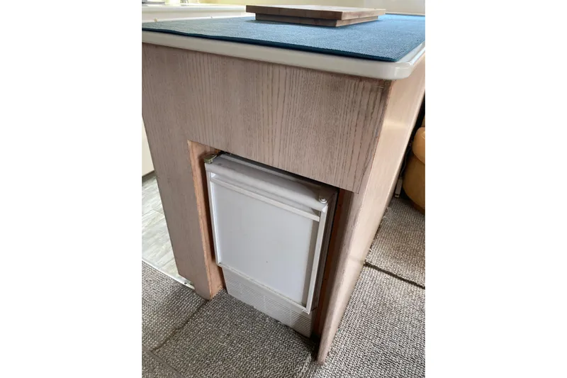  Yacht Photos Pics 1995 Hatteras 50 Convertible Sportfish interior with built-in mini fridge.