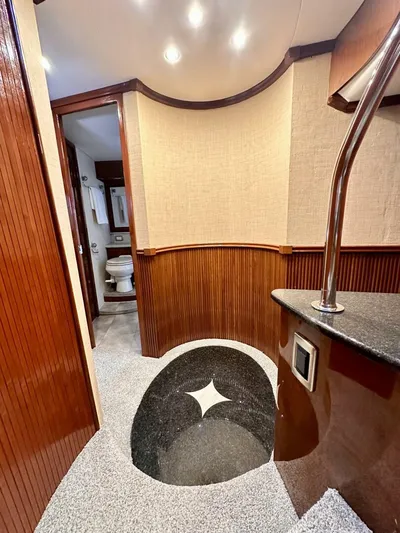  Yacht Photos Pics Interior of 2006 Marquis Flybridge Motor Yacht with elegant wood paneling and modern fixtures.