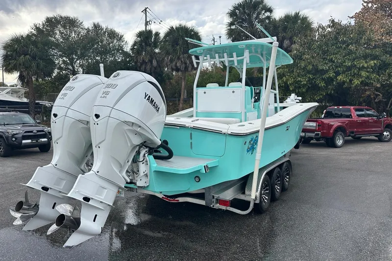  Yacht Photos Pics 2026 Stanley White Fishmaster boat with dual Yamaha engines on a trailer.