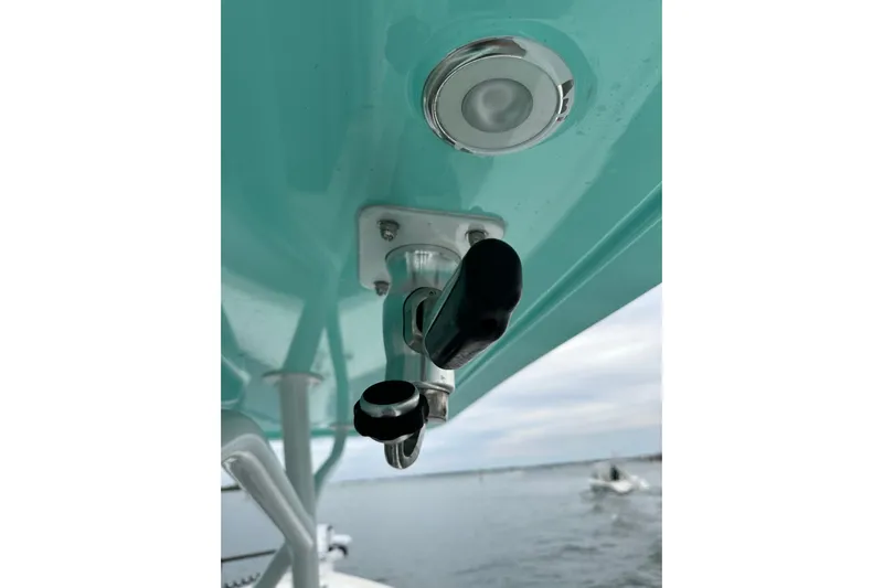  Yacht Photos Pics Close-up of Stanley White Fishmaster 2026 boat fixture against a serene water backdrop.