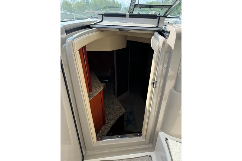  Yacht Photos Pics 2006 Sea Ray 38 Sundancer cabin entrance with open door, showing interior details.