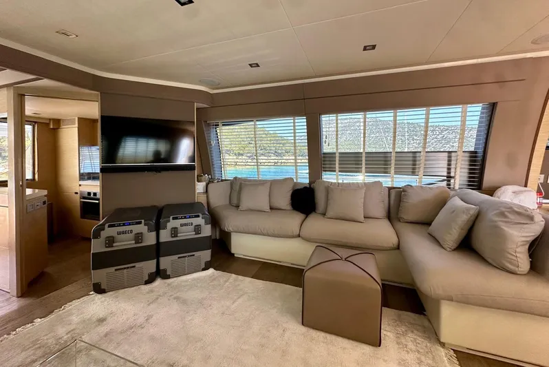  Yacht Photos Pics Luxurious interior of 2013 Ferretti Yachts 690 with plush seating and modern decor.