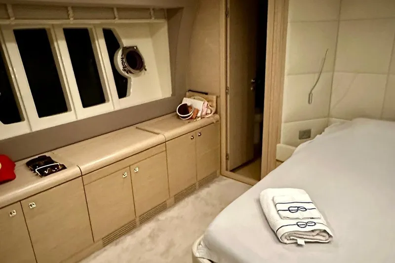  Yacht Photos Pics Luxurious cabin interior of 2013 Ferretti Yachts 690 with elegant furnishings.