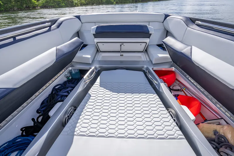  Yacht Photos Pics 2024 Nor-Tech 450 Sport Center Console interior with spacious seating and storage compartments.