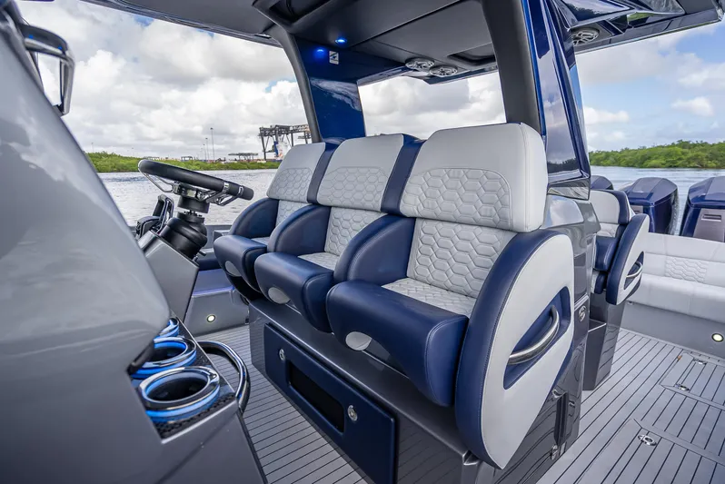  Yacht Photos Pics 2024 Nor-Tech 450 Sport Center Console interior with luxurious seating and modern design.