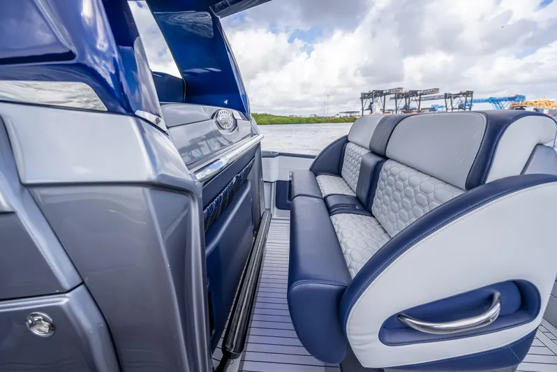  Yacht Photos Pics 2024 Nor-Tech 450 Sport Center Console interior with luxurious seating and modern design.