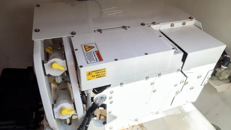  Yacht Photos Pics Engine compartment of a 2018 Intrepid 430 Sport Yacht, showcasing mechanical components.