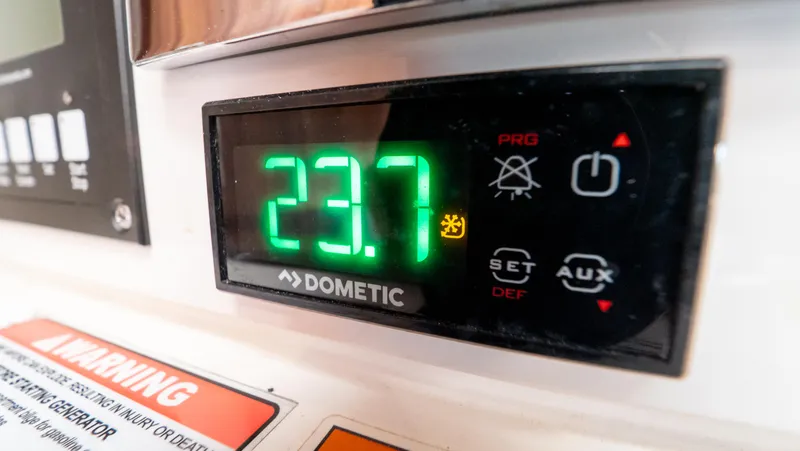  Yacht Photos Pics Digital temperature display on 2018 Intrepid 430 Sport Yacht, showing 23.7 degrees.