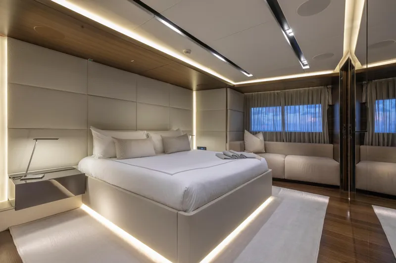 Safe Haven Yacht Photos Pics Luxurious yacht bedroom with modern design, featuring ambient lighting and elegant furnishings, Admiral Custom 2015.