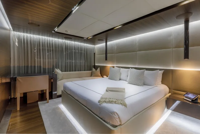 Safe Haven Yacht Photos Pics Luxurious yacht bedroom with modern design, featuring a large bed and ambient lighting, Admiral Custom 2015.