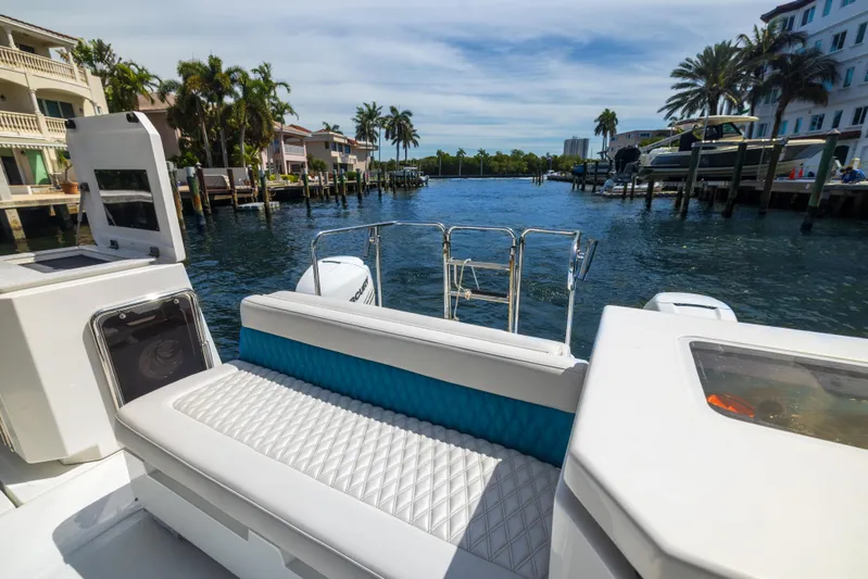  Yacht Photos Pics Aquila 36 Sport 2019 boat interior with waterfront view, featuring luxurious seating and modern design.