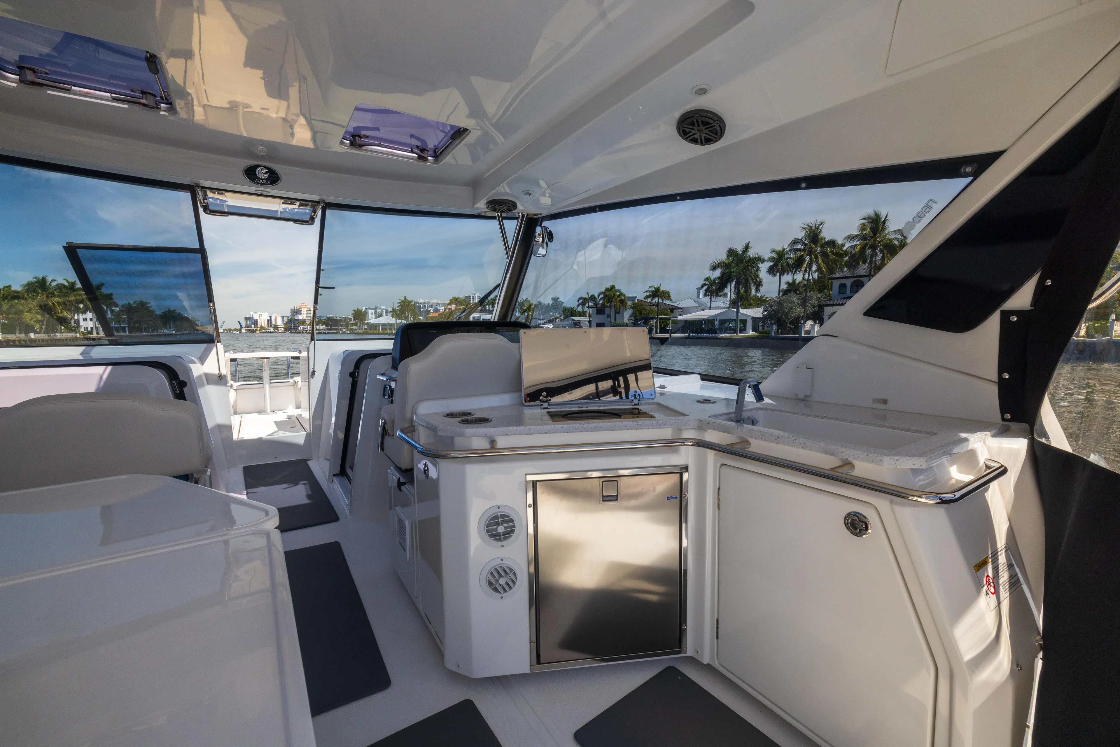  Yacht Photos Pics Interior of 2019 Aquila 36 Sport yacht with modern amenities and waterfront view.
