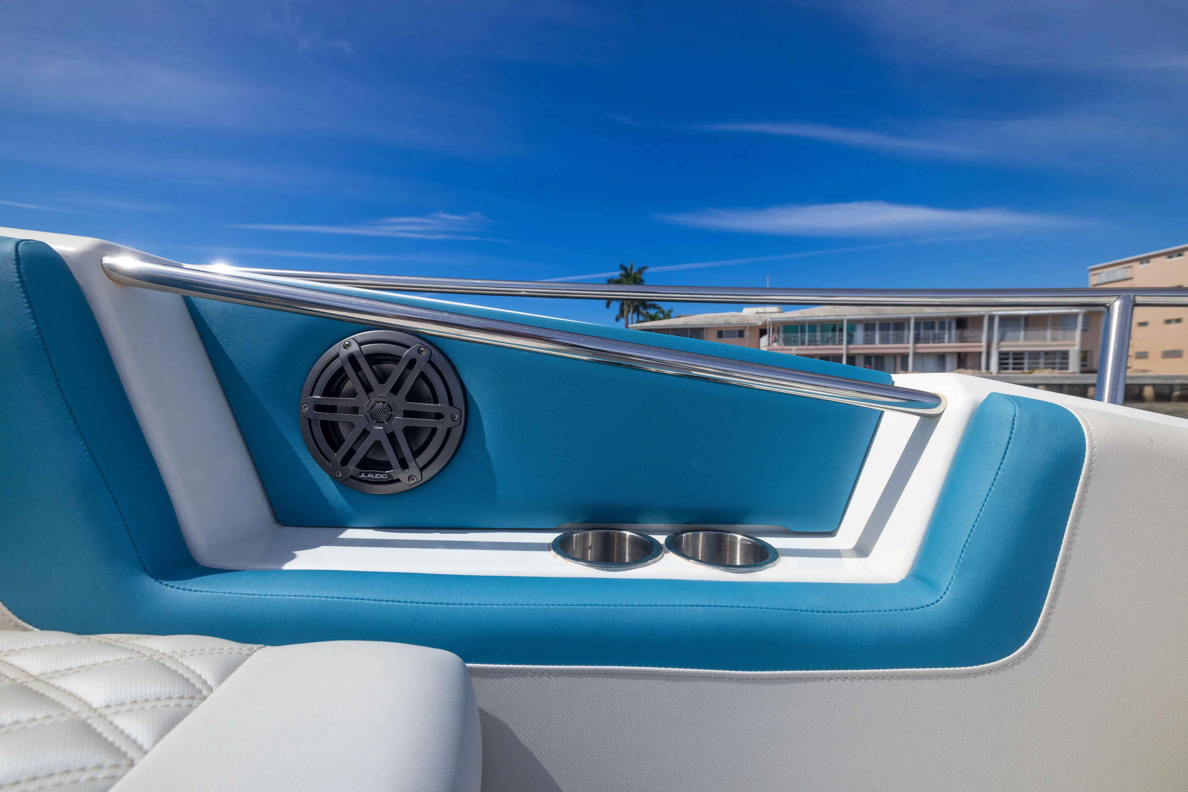  Yacht Photos Pics Aquila 36 Sport 2019 boat interior with blue accents and cup holders.