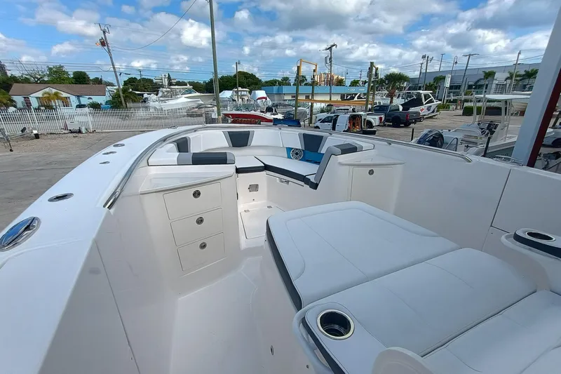 360-105 Yacht Photos Pics 2026 Robalo R360 Center Console boat interior with seating and storage compartments.