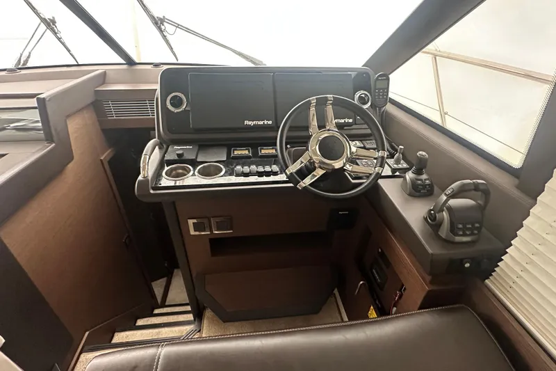World Wide Yacht Photos Pics Cockpit of 2020 Prestige 460 yacht with Raymarine navigation system and modern controls.