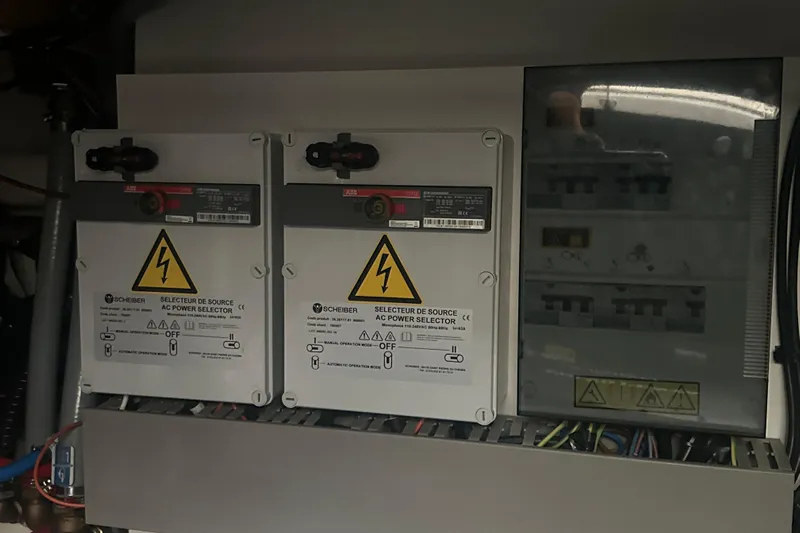 World Wide Yacht Photos Pics Electrical panel with AC power selectors in a 2020 Prestige 460 model.