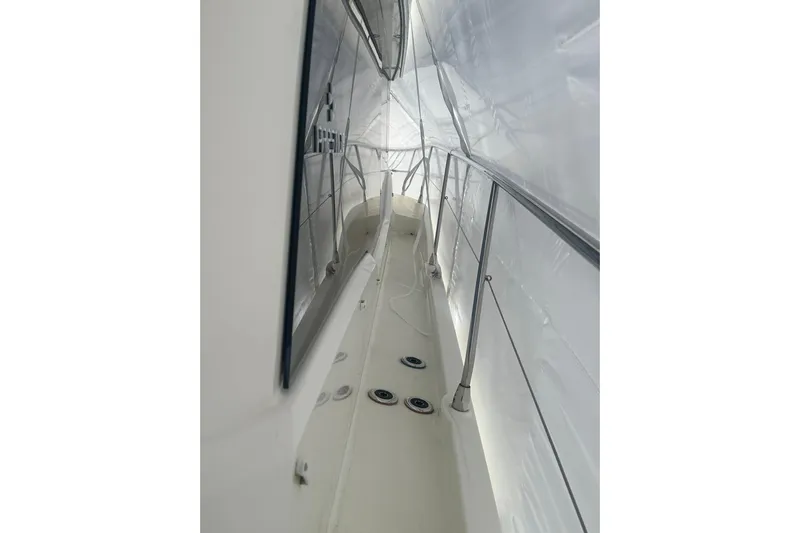 World Wide Yacht Photos Pics Side deck view of a 2020 Prestige 460 yacht, showcasing sleek design and railings.
