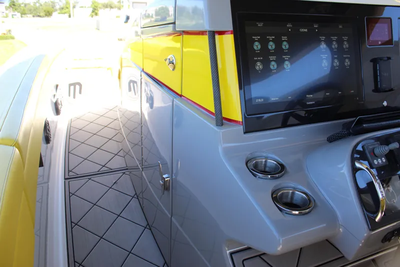  Yacht Photos Pics 2021 Mystic M4200 boat interior with touchscreen controls and sleek design.