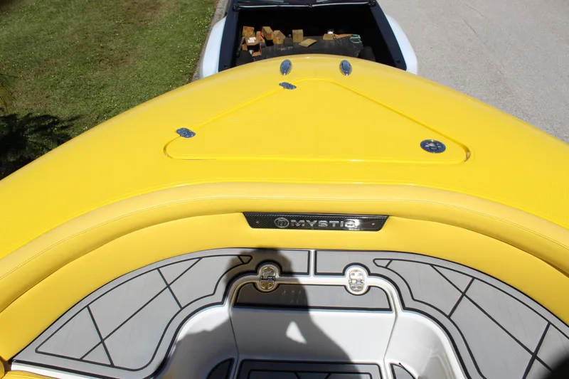  Yacht Photos Pics Yellow Mystic M4200 boat bow, 2021 model, with sleek design and modern detailing.