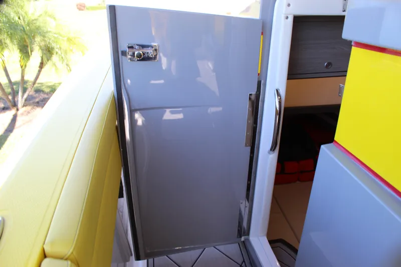  Yacht Photos Pics Open cabin door on 2021 Mystic M4200 boat, featuring sleek design and vibrant colors.