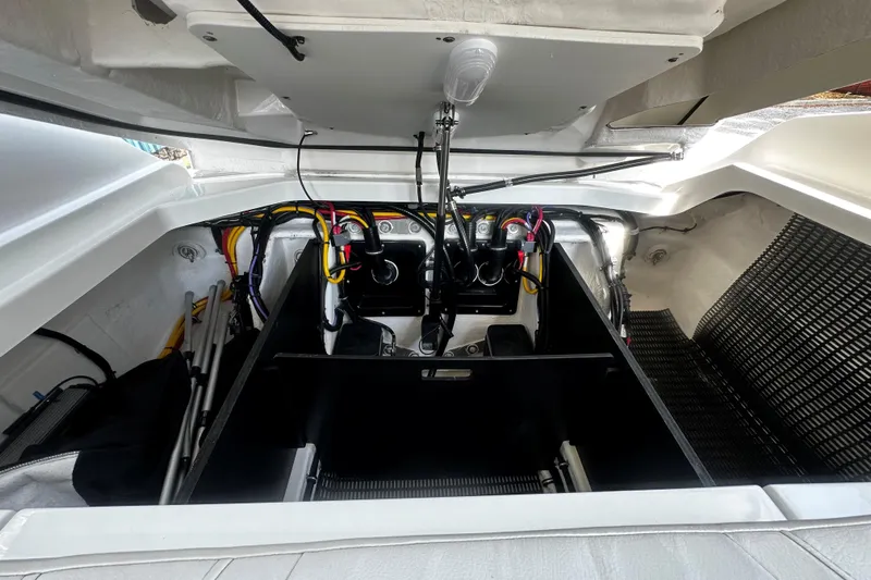  Yacht Photos Pics Engine compartment of 2023 Monterey 305SS Super Sport boat, showcasing wiring and components.