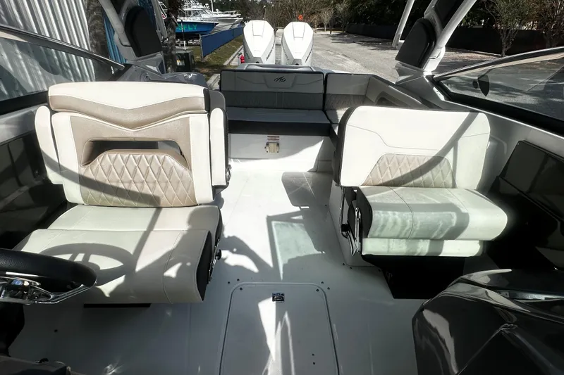  Yacht Photos Pics 2023 Monterey 305SS Super Sport boat interior with luxurious seating and modern design.