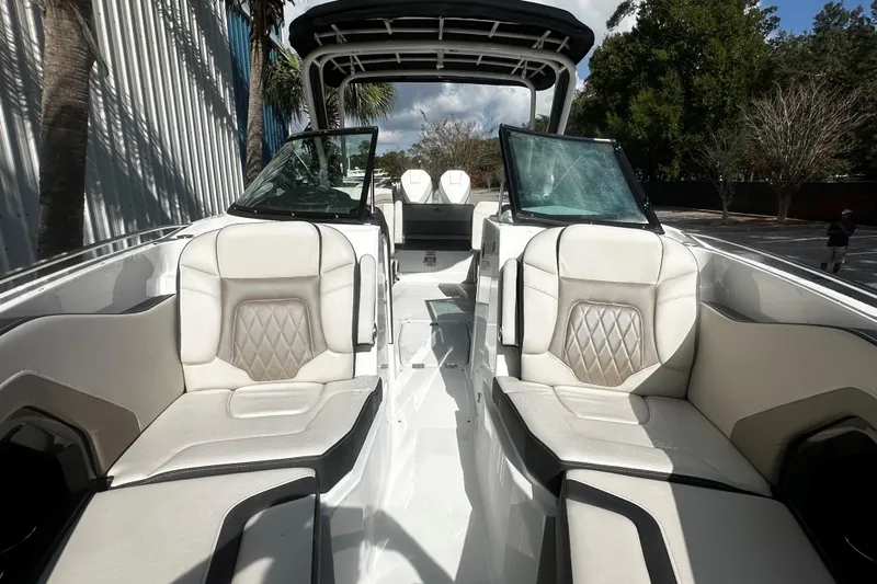  Yacht Photos Pics 2023 Monterey 305SS Super Sport boat interior with luxurious seating and modern design.