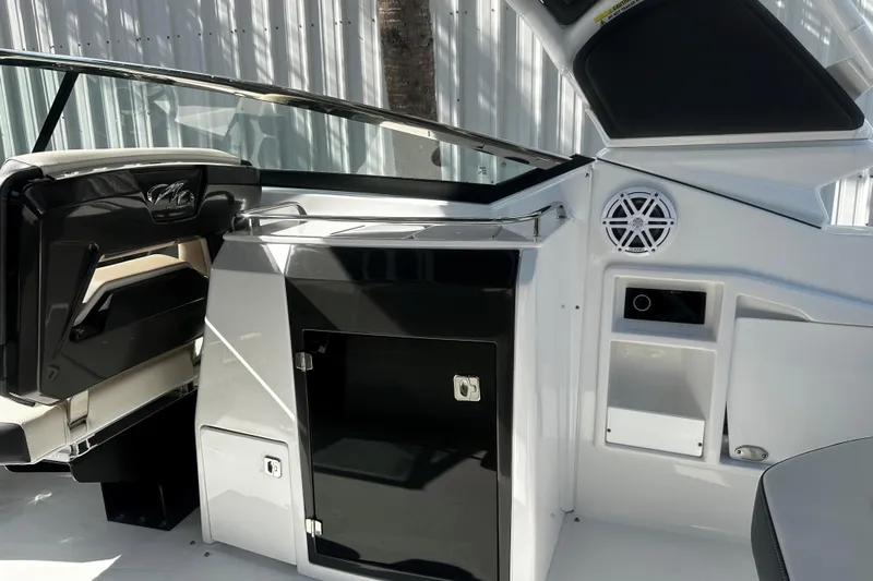  Yacht Photos Pics 2023 Monterey 305SS Super Sport boat interior with sleek design and modern features.