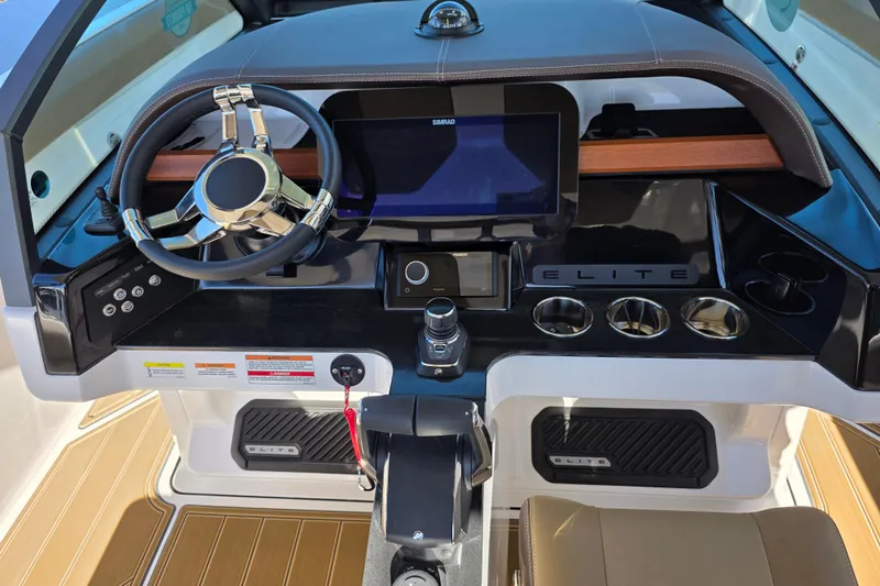  Yacht Photos Pics 2026 Monterey Elite 30 OB boat dashboard with modern controls and sleek design.