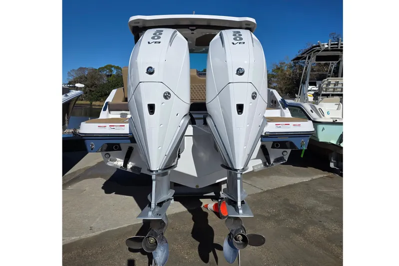  Yacht Photos Pics Monterey Elite 30 OB 2026 with dual outboard engines.