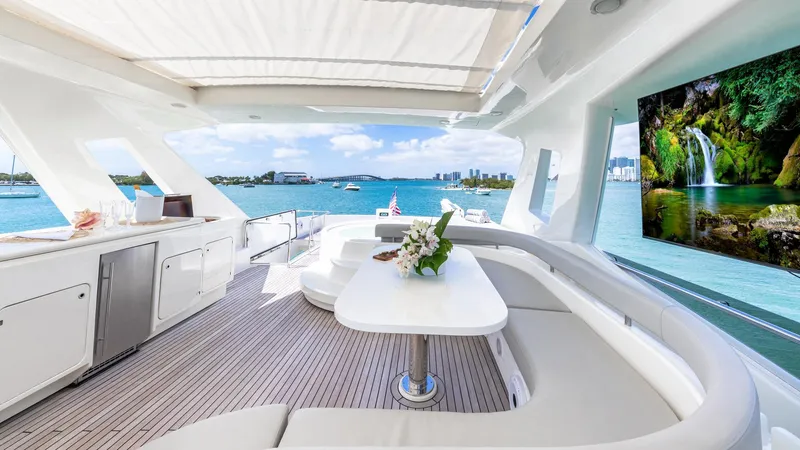 Hoya Saxa Yacht Photos Pics Luxurious 2013 Ferretti Yachts 870 Flybridge with elegant seating and scenic ocean view.