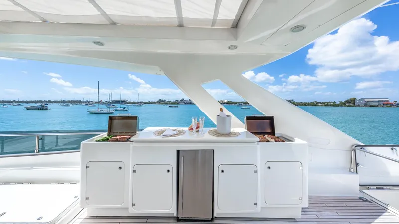 Hoya Saxa Yacht Photos Pics Luxurious outdoor kitchen on 2013 Ferretti Yachts 870 FLYBRIDGE with ocean view.