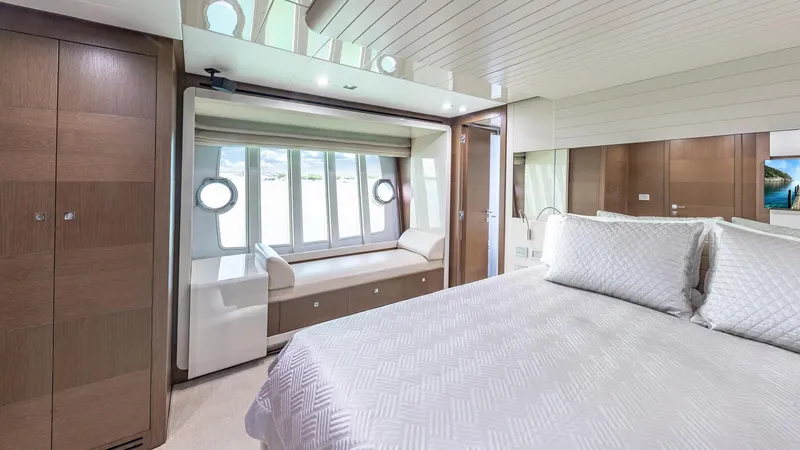 Hoya Saxa Yacht Photos Pics Luxurious bedroom interior of 2013 Ferretti Yachts 870 FLYBRIDGE with elegant wood finishes.