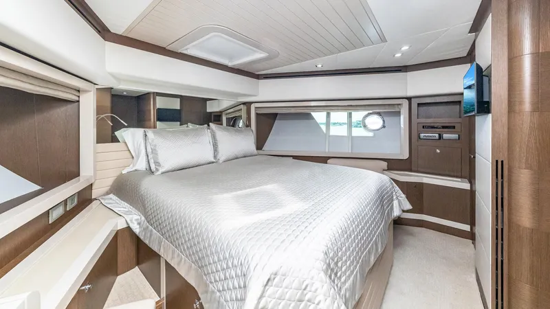 Hoya Saxa Yacht Photos Pics Luxurious bedroom interior of 2013 Ferretti Yachts 870 FLYBRIDGE with elegant bedding and modern design.