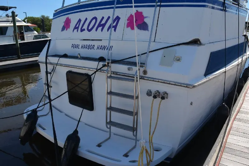 Aloha Yacht Photos Pics 1988 Marine Trader 47 Tradewinds yacht docked, named "Aloha," Pearl Harbor, Hawaii.