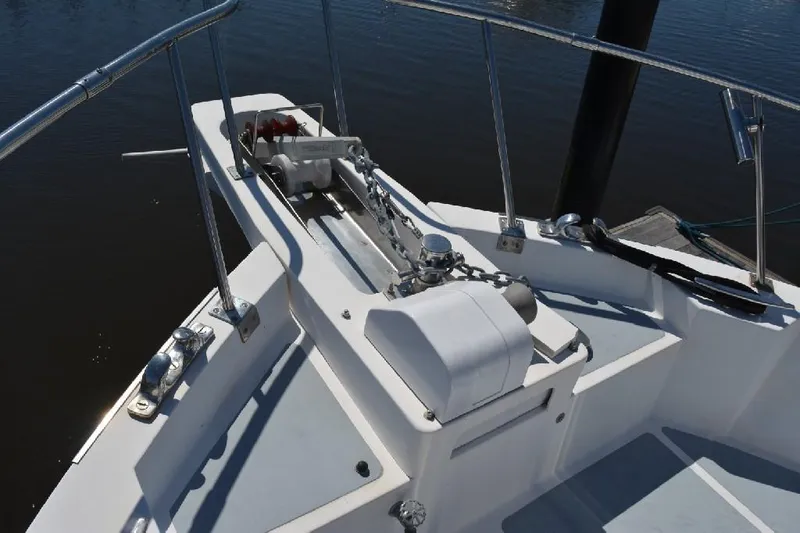 Aloha Yacht Photos Pics 1988 Marine Trader 47 Tradewinds yacht bow with anchor and railing.