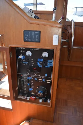 Aloha Yacht Photos Pics Control panel of a 1988 Marine Trader 47 Tradewinds yacht, featuring navigation instruments.