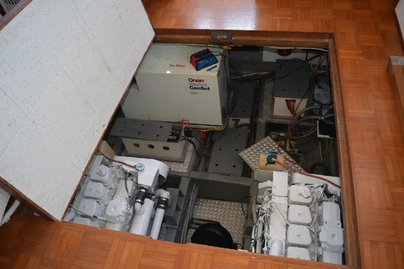 Aloha Yacht Photos Pics Engine room of 1988 Marine Trader 47 Tradewinds with Onan generator and equipment.