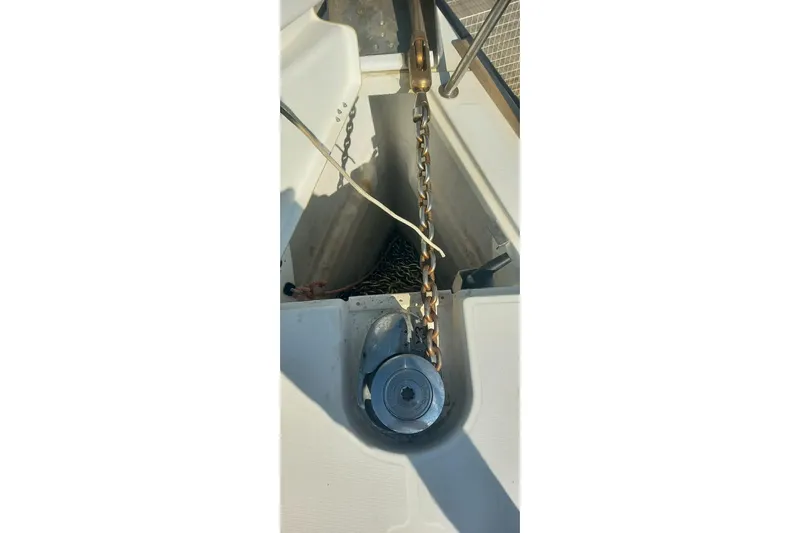  Yacht Photos Pics Anchor chain mechanism on a 2010 Jeanneau 53 sailboat deck.