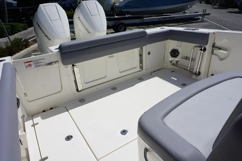 Bwce1064l324 Yacht Photos Pics 2024 Boston Whaler 330 Outrage boat interior with dual Mercury outboard engines.