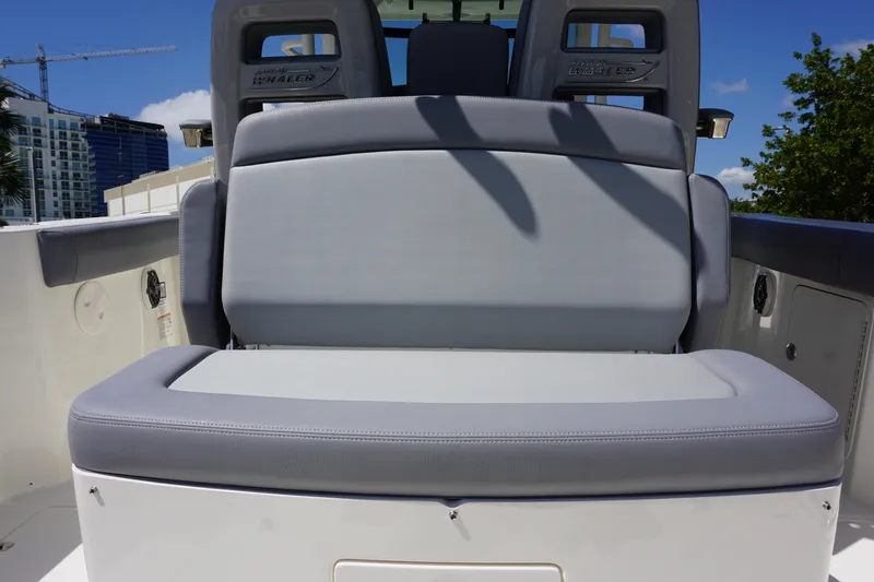 Bwce1064l324 Yacht Photos Pics 2024 Boston Whaler 330 Outrage boat seating area with gray cushions.