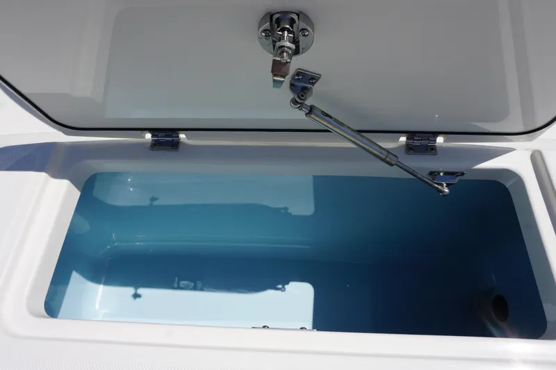 Bwce1064l324 Yacht Photos Pics Open storage compartment of 2024 Boston Whaler 330 Outrage boat.