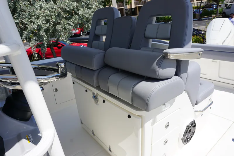 Bwce1064l324 Yacht Photos Pics 2024 Boston Whaler 330 Outrage boat seating area with cushioned seats.