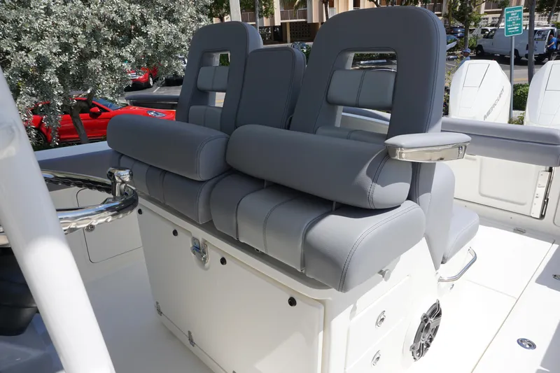 Bwce1064l324 Yacht Photos Pics 2024 Boston Whaler 330 Outrage boat seating area with gray cushioned seats.