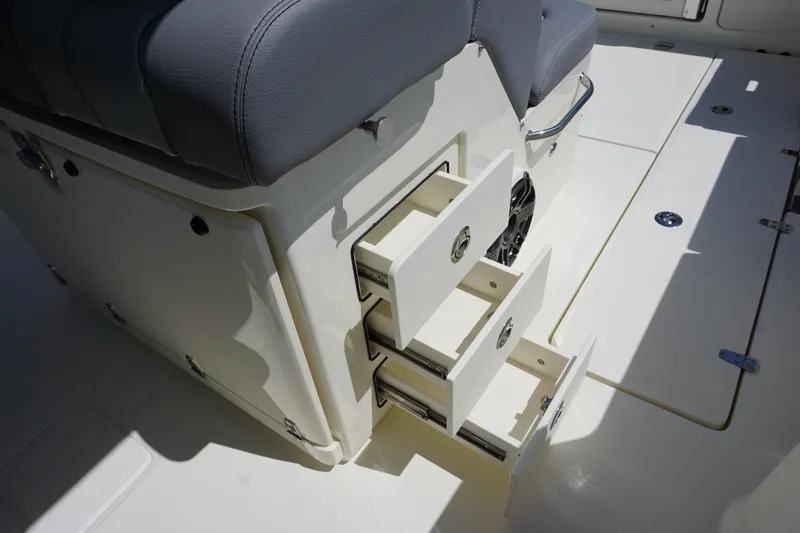 Bwce1064l324 Yacht Photos Pics 2024 Boston Whaler 330 Outrage boat storage drawers and seating.