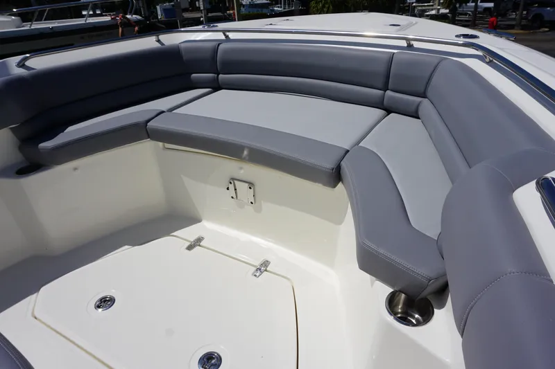 Bwce1064l324 Yacht Photos Pics 2024 Boston Whaler 330 Outrage boat with spacious cushioned seating area.