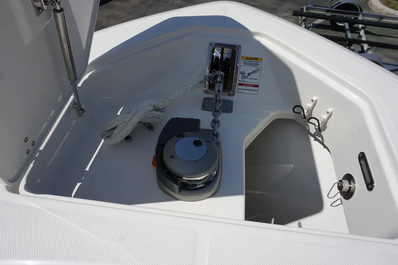 Bwce1064l324 Yacht Photos Pics 2024 Boston Whaler 330 Outrage anchor locker with windlass and rope.
