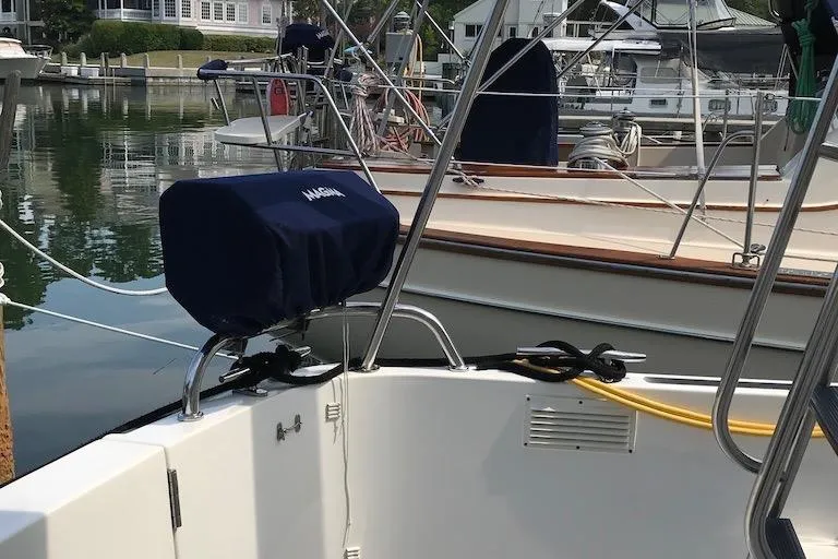 Egret Yacht Photos Pics Cockpit on 2005 Nordic Tug 37 Flybridge featuring Magma propane grill and transom door to swim platform