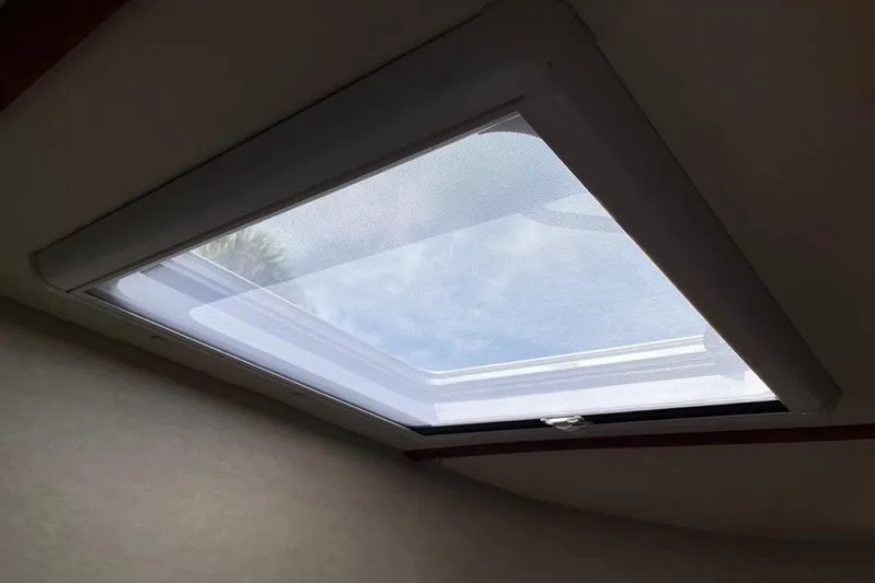 Egret Yacht Photos Pics Oceanair style cover with screen pulled under Bomar opening Hatch