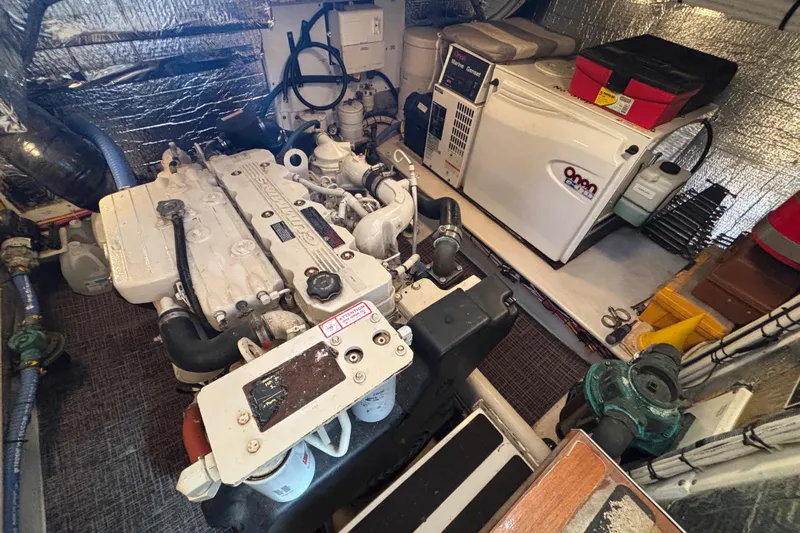 Egret Yacht Photos Pics Engine Compartment to port side on 2005 Nordic Tug 37 showing Onan Generator in sound box
